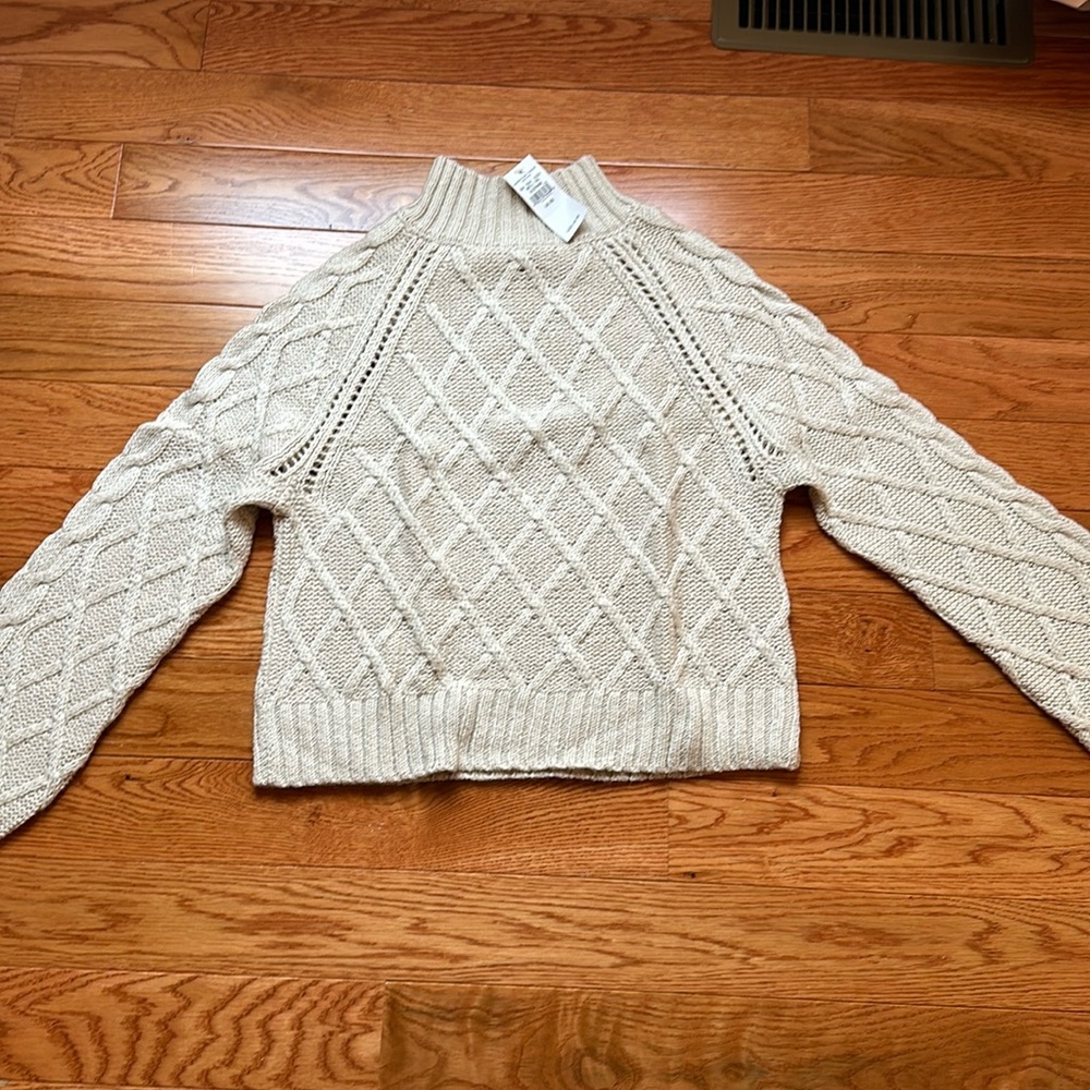Extra small, beige turtle neck.